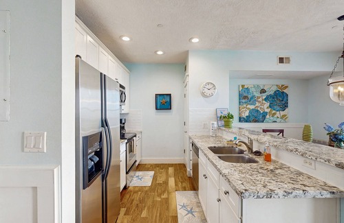 Red Fish Cove Condo | Waterfront condo with pool, hot tub, Gulf views & nearby beach access