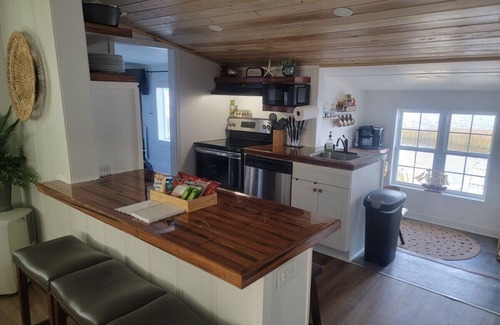 Cedar Point House | Waterfront cottage with a jon boat, Kayaks, and three miles to the beach