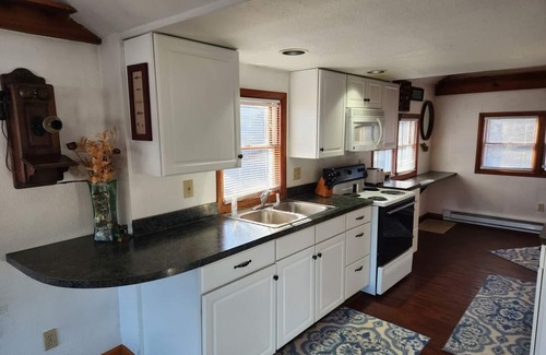 Colton Cottage | Waterfront Cottage with Hot Tub! Sleeps 6, Free Kayaks, Bikes & Hiking Trail!