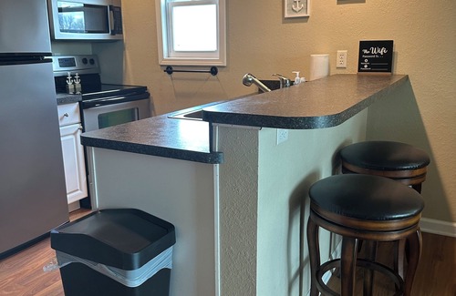 Oak Harbor Condo | Waterfront Cozy 1 Bedroom Condo on the inlet to Lake Erie boat dock steps away.