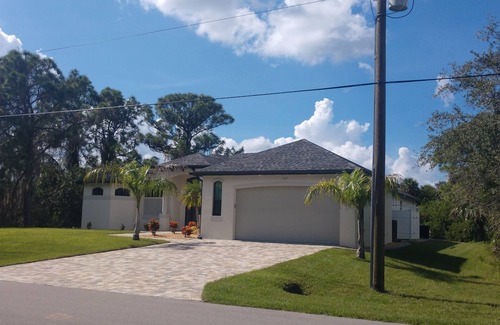 Port Charlotte House | Waterfront Custom Home with Gulf access & Heated Pool