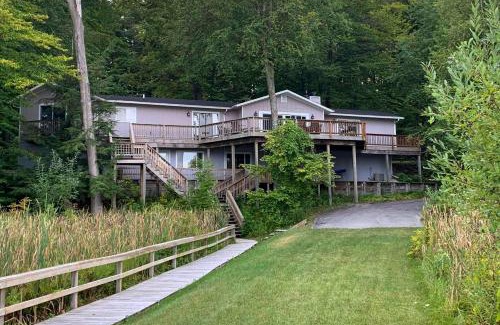 Rapid City House | Waterfront Deck and Dock Torch Lake Home!