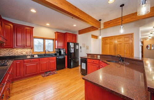 Waterfront Greens House | Waterfront Dreams: Lakefront, Indoor Pool, Dock Slip & Hot Tub!