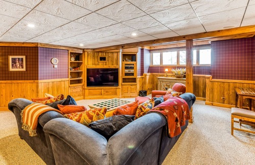 Three Lakes House | Waterfront elegance with private beach & hot tub - dogs welcome