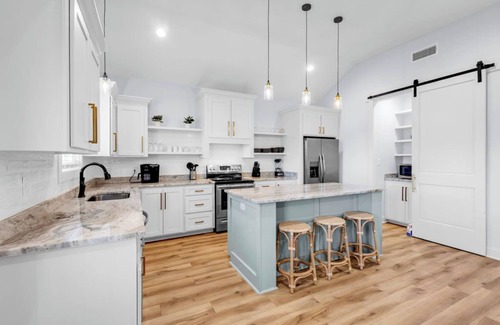 Shoreline Park House | Waterfront Escape in Bay STL with dock, ping pong, basketball, cornhole & more!