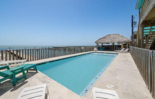 Flour Bluff House | Waterfront Escape w Views Shared Pool Boat Dock Orange Crush by AvantStay