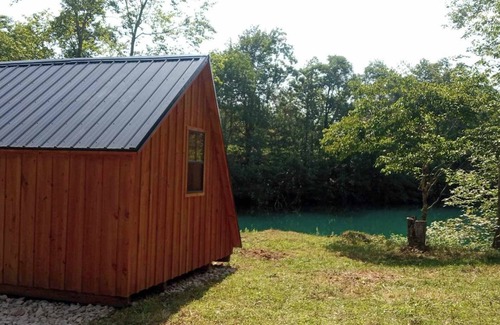 Mount Storm Cabin | Waterfront Glamping Cabin On Private Blue Water Mountain Top Lake