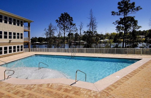 Foley Condo | Waterfront - great fishing, peaceful & quiet, yet close to Tanger Outlets & OWA
