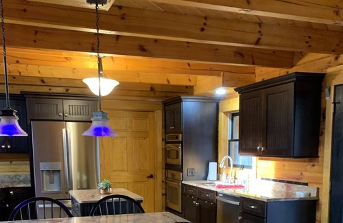 Lanexa Cabin | Waterfront Handicap accessible home with Fire pit, hot tub & dock