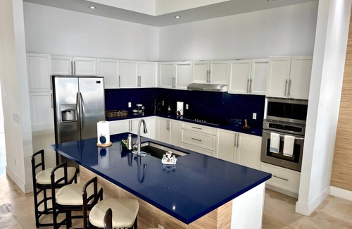Alice Town Villa | Waterfront Home w/Ocean View | Pool, Dock & Games