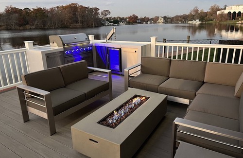 Great River House | Waterfront home, deck, bbq, fire pit, boats, hot tub, and more!