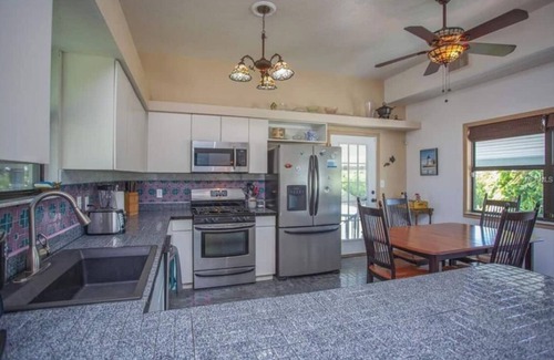 Tampa House | Waterfront Home in Beautiful Nature Preserve; Kayaks, Hot Tub,Fire Pit, Pets ok!