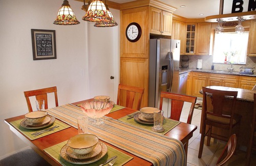 Garden Isles House | Waterfront Home, Large Heated Pool, 5 min. from the beach, family friendly