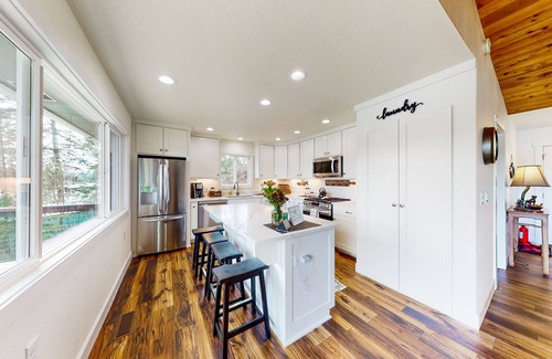 Coeur d'Alene House | Waterfront home on Spokane River with dock, decks & 2 complete living spaces