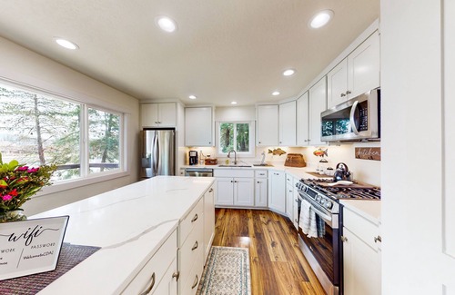 Coeur d'Alene House | Waterfront home on Spokane River with dock, decks & 2 complete living spaces