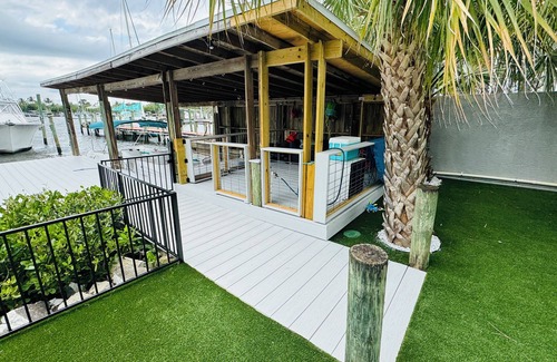Stuart House | Waterfront Home on the Harbor with a Pool, Boat Dock & Pet Friendly!