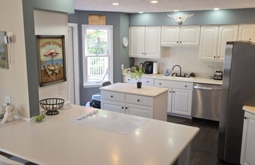 Spring Lake House | Waterfront home Spring Lake hot tub, firepit, gas grill fishing