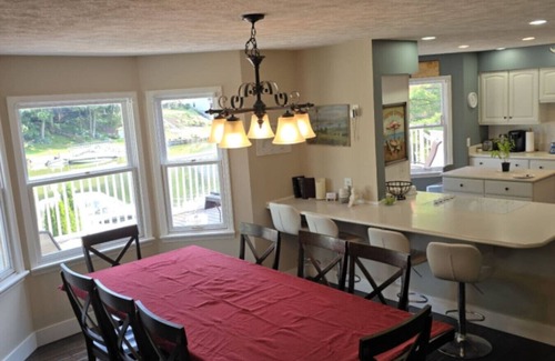 Spring Lake House | Waterfront home Spring Lake hot tub, firepit, gas grill fishing
