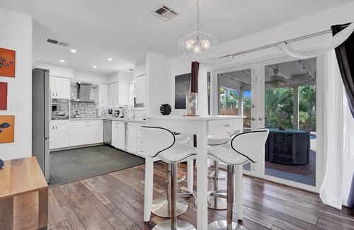 Coral Ridge Isles House | Waterfront Home Heated Pool BBQ Parking!