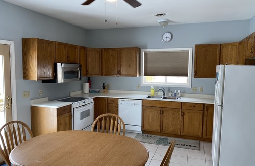Houghton Lake House | Waterfront Home with Dock, Boat Launch, and Movie Theatre Room!