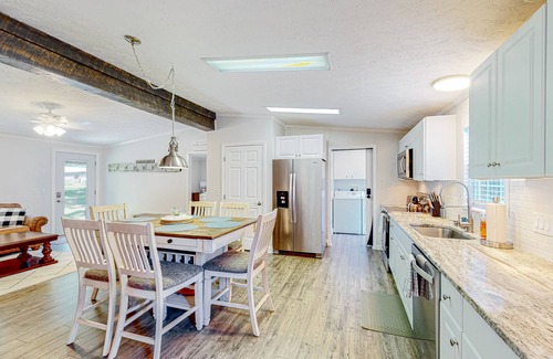 Bumpass House | Waterfront home with boat dock, outdoor bar/TV, firepit, and yard games