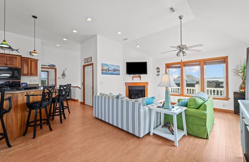 Frisco House | Waterfront home with boat dock, shared pool, & balcony with ocean view