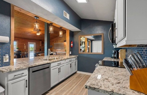 Highlands House | Waterfront Home with Boat Launch and Dock, Pool & basketball/pickleball court mini golf, playground