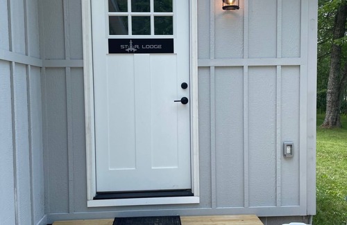 Scottville House | Waterfront home with Star Wars themed bunk room on all sports lake.