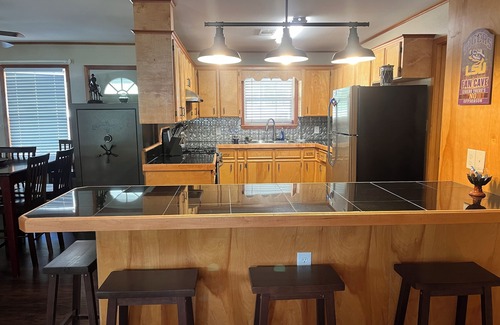 Negreet House | Waterfront house with boathouse, boat launch, outdoor kitchen, fire pit