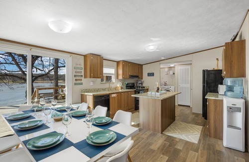 Seven Points Cottage | Waterfront Lake Cottage, Spacious Outdoor Deck & Dock! Dog friendly firepit &BBQ