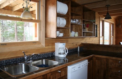 Glovertown Ski Chalet | Waterfront log chalet. The perfect getaway, a hidden gem.