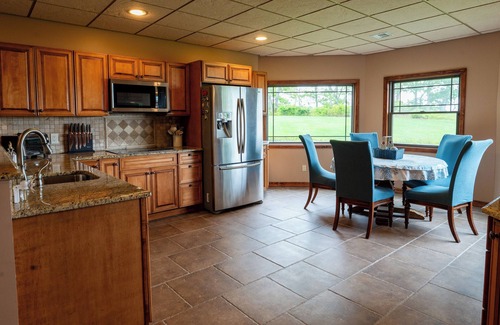 East Moriches Apartment | Waterfront Luxe Retreat in Mansion + Beach Access