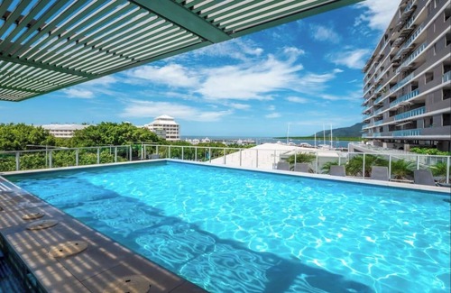 Cairns Central Business District Condo | Waterfront Luxury at Harbour Lights: Stunning Marina Views & Prime Cairns Location