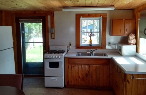 Manistique Cabin | Waterfront Modernized Rustic Log Cabin on Indian Lake, Manistique, MI
