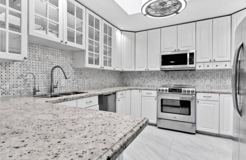 Coral Shores Villa | Waterfront Paradise: Heated Pool, Marina, Kayaks, 1 mile to the beach