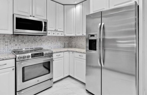 Coral Shores Villa | Waterfront Paradise: Heated Pool, Marina, Kayaks, 1 mile to the beach