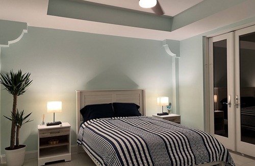 Bonita Springs House | Waterfront Pet Friendly Guest Suite with Pool, Mini Beach