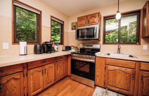 Bushkill House | Waterfront Pocono Home HotTub, Sauna & Fishing