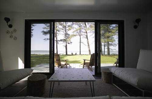 White Stone House | Waterfront, Private Beach, Mid Century Style