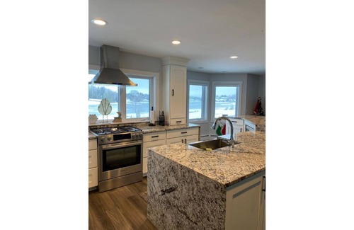 Cheboygan House | Waterfront retreat-Dock. Kayaks. Beach. Arcade. Private.