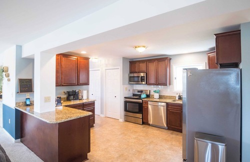 White Stone House | Waterfront Retreat w/Hot Tub, Game Room, Kayaks, 2 Kings, + more!