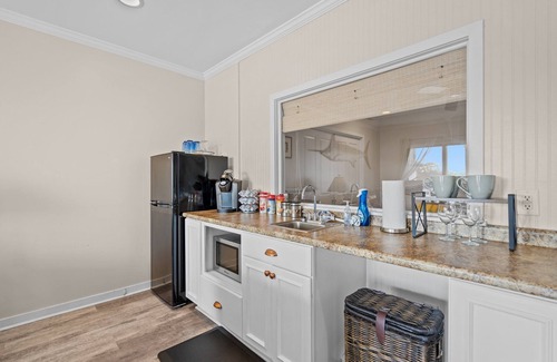 Southport Condo | Waterfront Retreat walkable to the best shops, restaurants, & charm of Southport