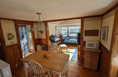 Centerville Cottage | Waterfront! Riverfront delight. 2 BR, private, decks. Steps to Craigville Beach