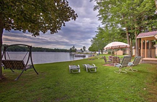 Le Roy House | Waterfront Rose Lake Cabin with Fire Pit, Dock, Boats
