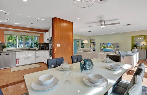 Coral Ridge Isles House | Waterfront Serenity. Pool & BBQ. Koi Pond