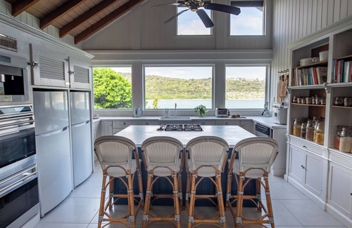 Liberta Villa | Waterfront Spacious 5-bedroom villa in Mamora Bay,Watersports Games room,