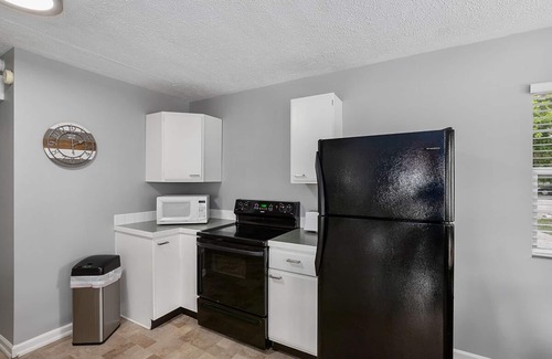 Newaygo Condo | Waterfront Suite: Dock, Kayaks, Firepit, BBQ