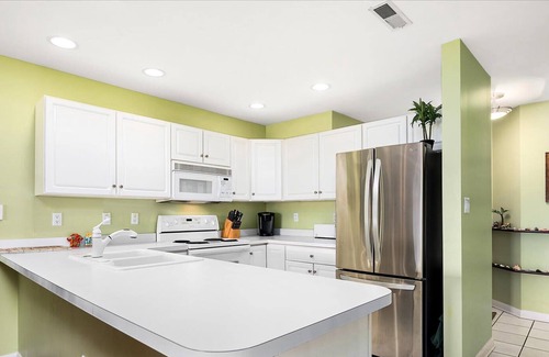 Heron Harbour Isle Condo | Waterfront Three Bedroom Condo with Pool