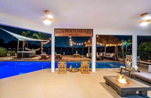 Florida North Atlantic Coast Villa | Waterfront Villa with Beach, Pool, Cinema, Game Room and Tiki