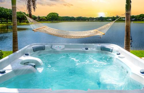 Florida North Atlantic Coast Villa | Waterfront Villa with Beach, Pool, Cinema, Game Room and Tiki